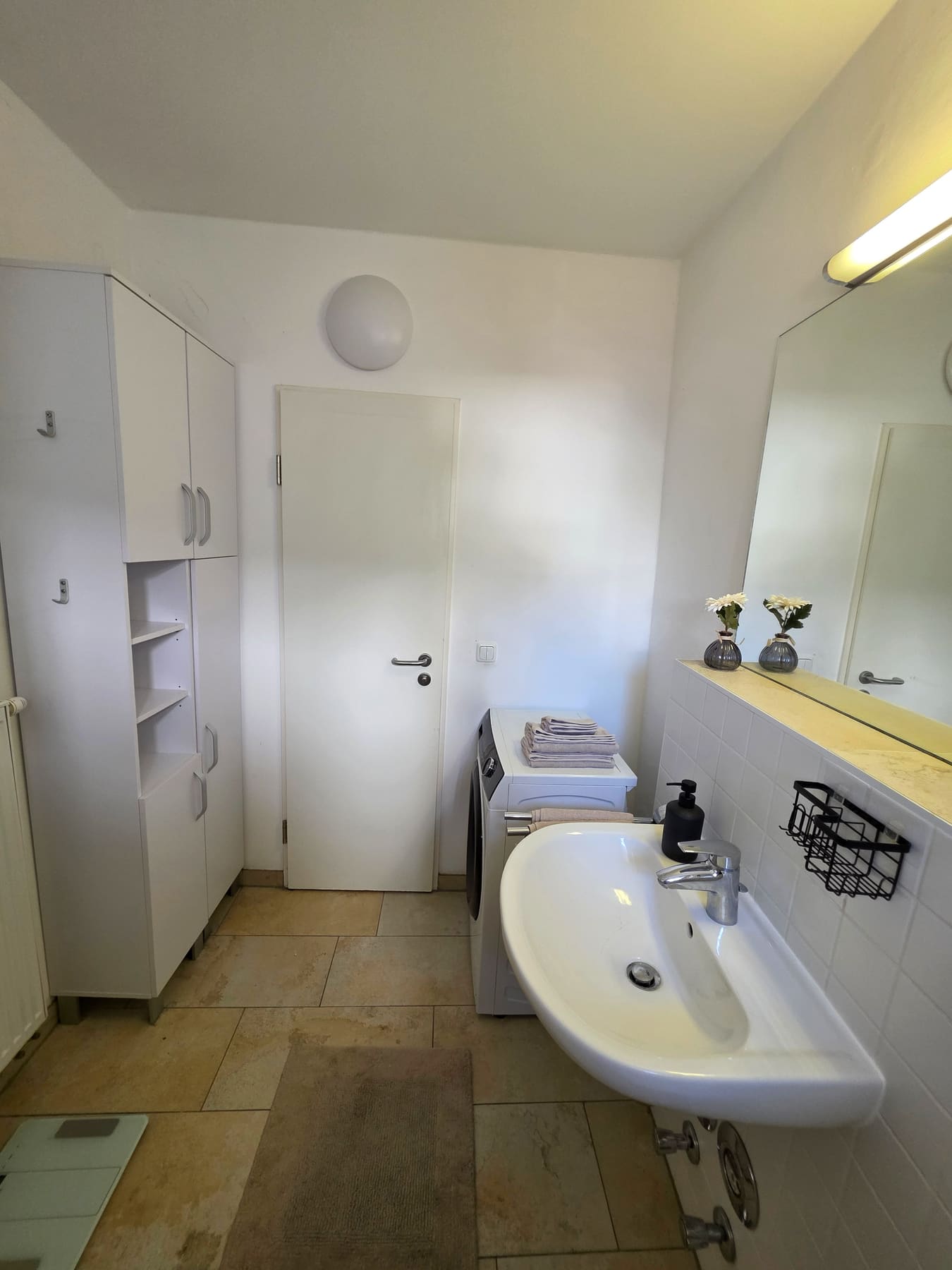 Bathroom entry with storage