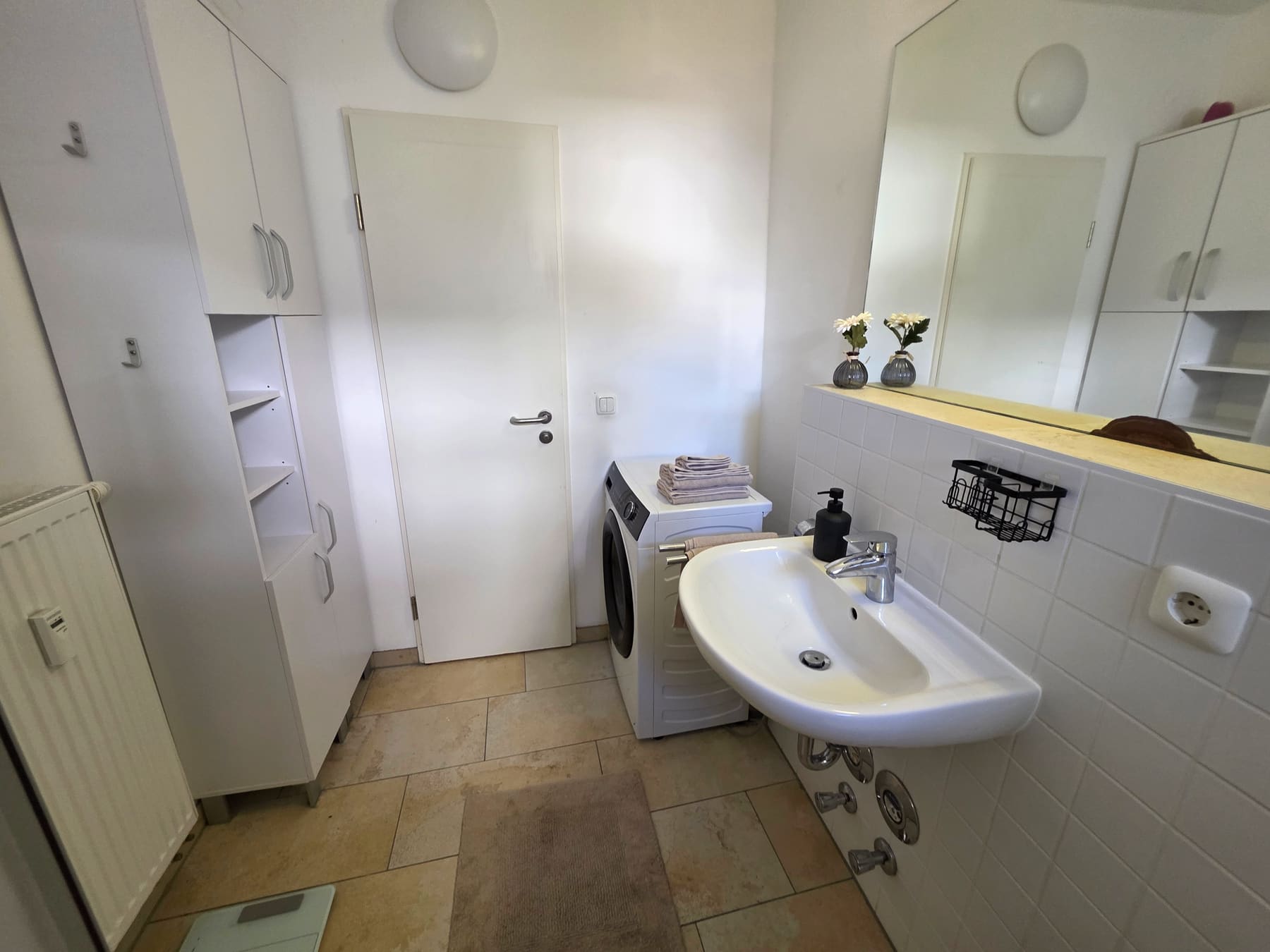 Washing machine in the bathroom