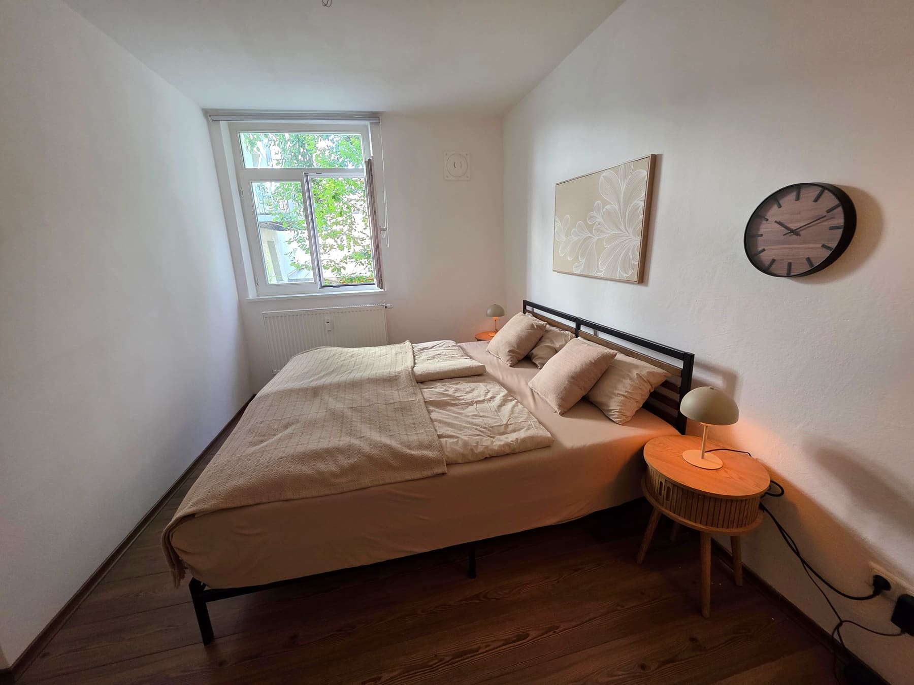 Bedroom with the bed freshly made up
