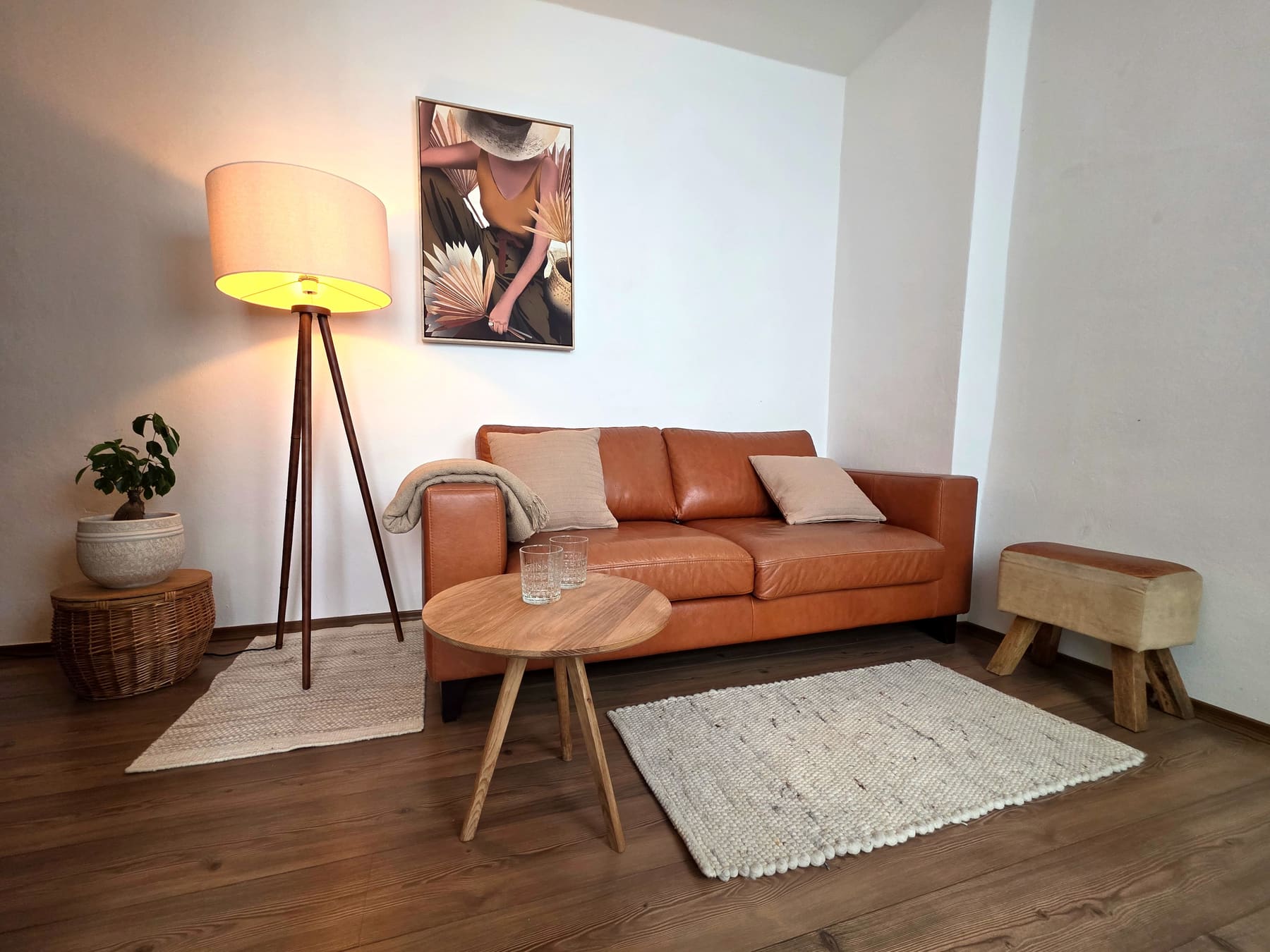 Sofa corner with the tripod lamp