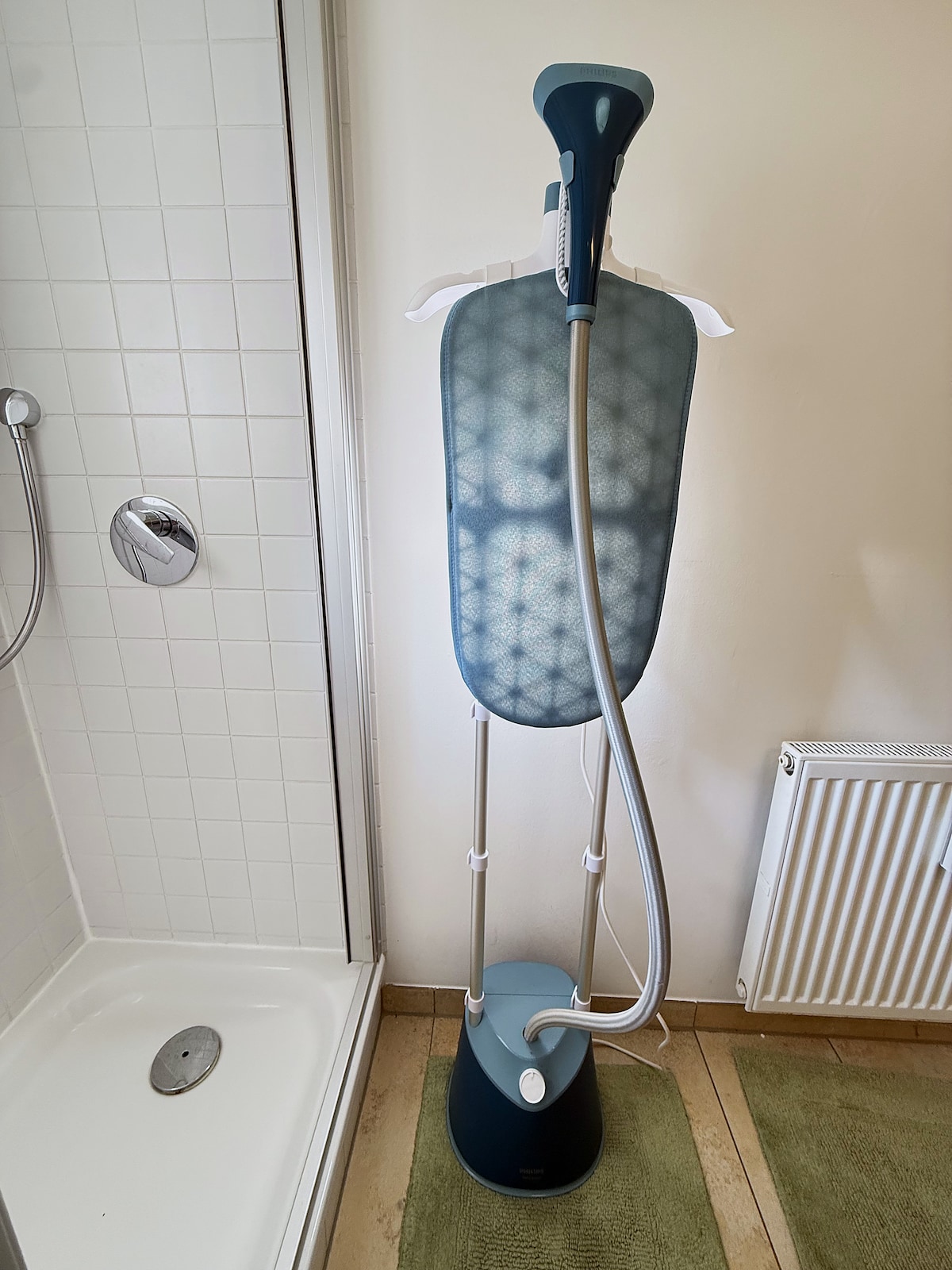 The Philips garment steamer, kept in the bathroom